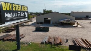 front aerial view of metals 2 go and sign