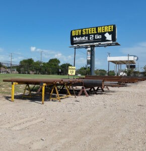 discounted remnants and metals 2 go sign