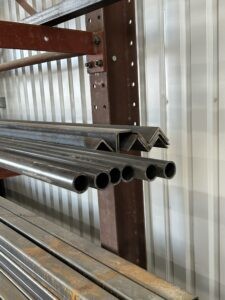pipe and angle on indoor rack